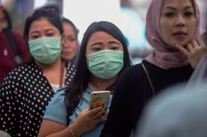 DITENGAH SEBARAN VIRUS CORONA: Ada Mengenakan Masker-Ada yang Tidak