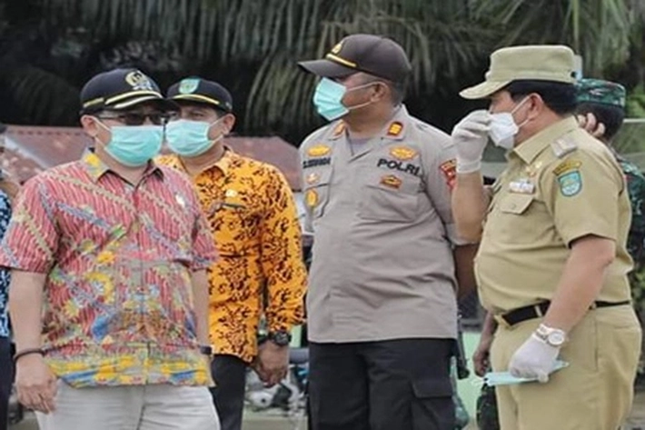 Pemkab dan Forkopimda Rohul Bagikan 6.000 Masker Gratis