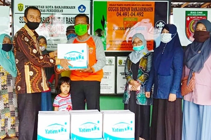 Rumah Yatim Cabang Riau Bantu Siswa, Guru dan Warga Prasejahtera