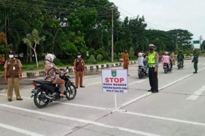 Tim Yustisi Covid-19 Pelalawan Jaring Pelanggar Prokes di Jalintim