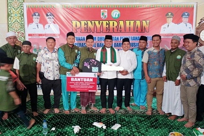 Musim Mas Bantu Dhuafa yang Disaksikan Bupati Zukri Misran