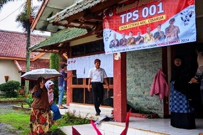 Hari Pencoblosan 14 Februari 2024 di Landa Hujan Lebat, 'Tetapi Tidak Menyurutkan Beri Hak Suara'