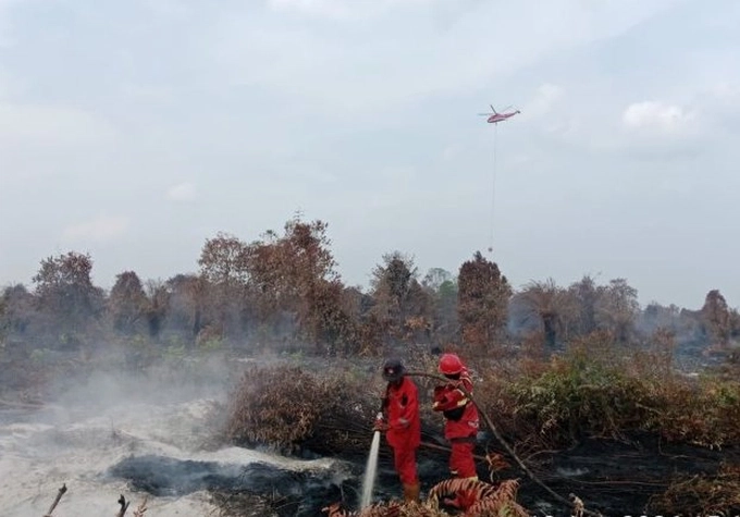 Kerjasama Sinergi TNI-Polri dan Manggala Agni Berhasil Turunkan Titik Panas Karhutla di Riau 